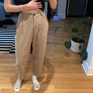 Cropped beige trousers